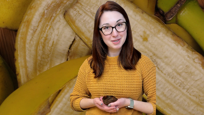 Alex Dainis holding a bioplastic bowl in front of bananas
