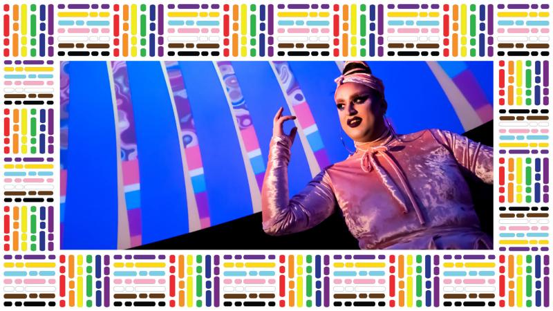 The drag queen Coleslaw, with a rainbow border made of dashes.