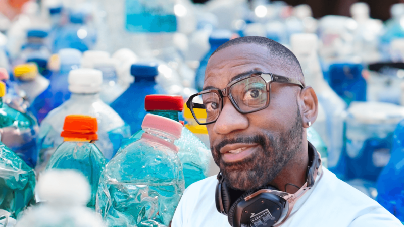 Maynard Okereke in front of plastic bottles