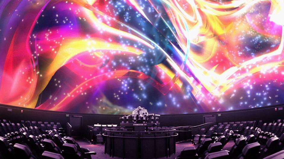 Streams of different colors projected on the Planetarium dome.