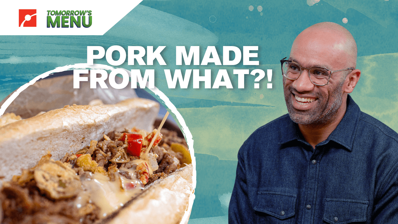 Chef Douglass Williams next to a hoagie made with lab grown meat