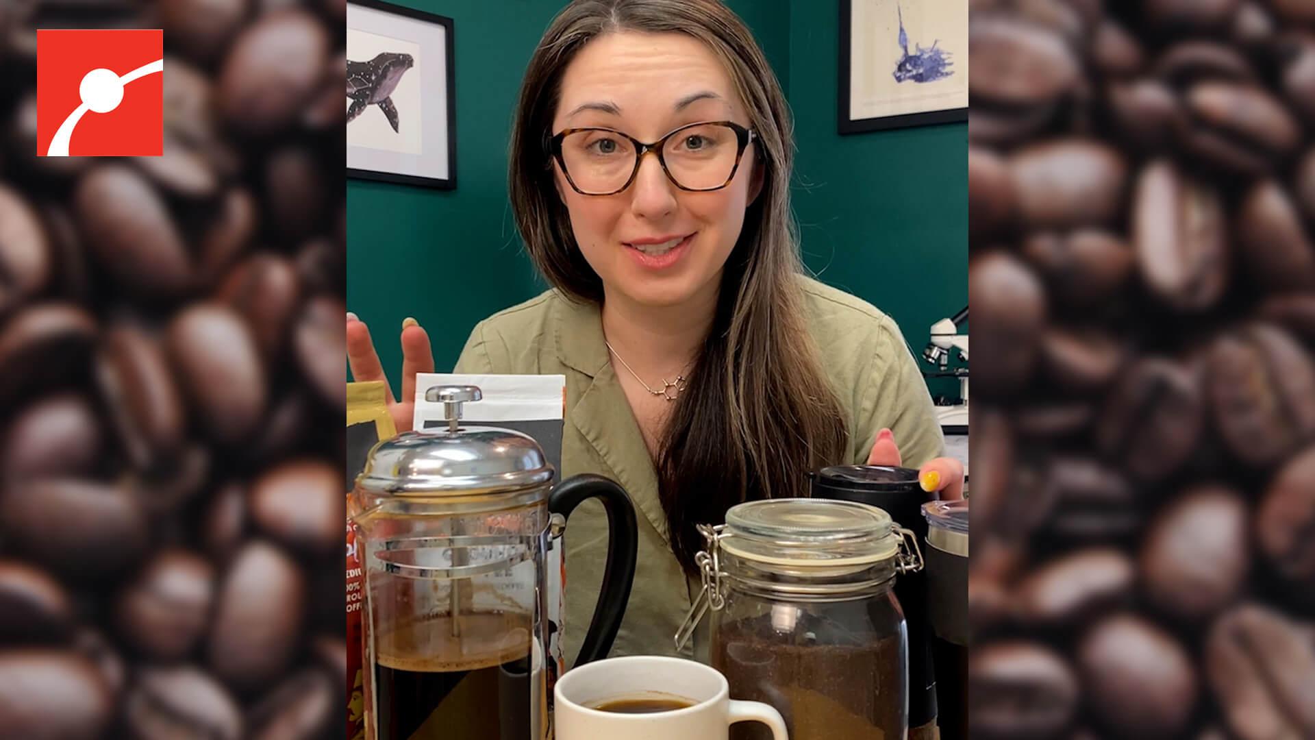 Alex Dainis with coffee in front of her