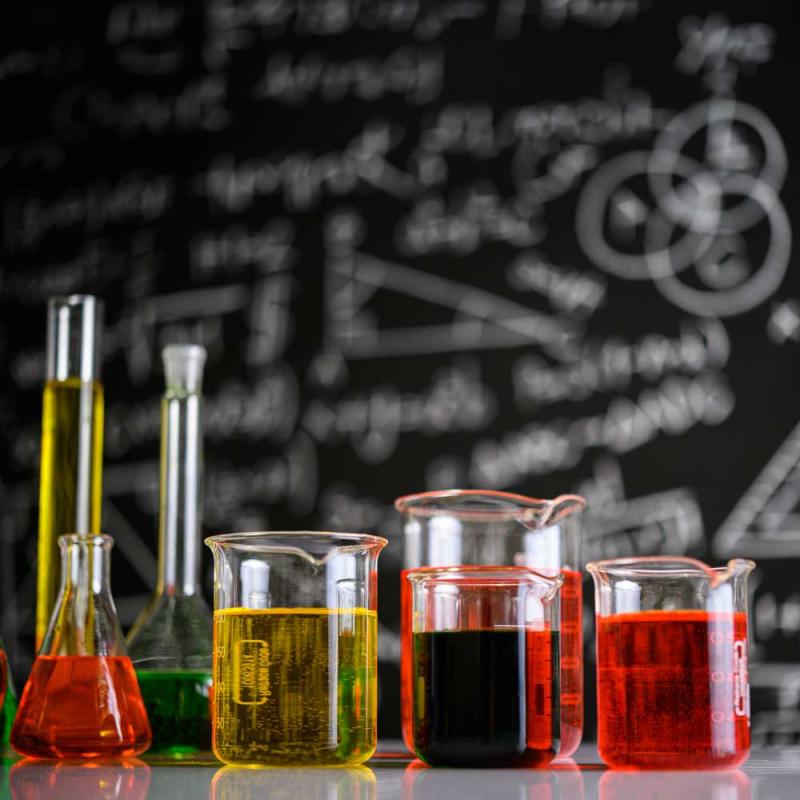 Beakers and flasks filled with colorful liquids.